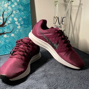 Nike Women's downshifted 7 running shoes in a purple tea berry colorway size 11.